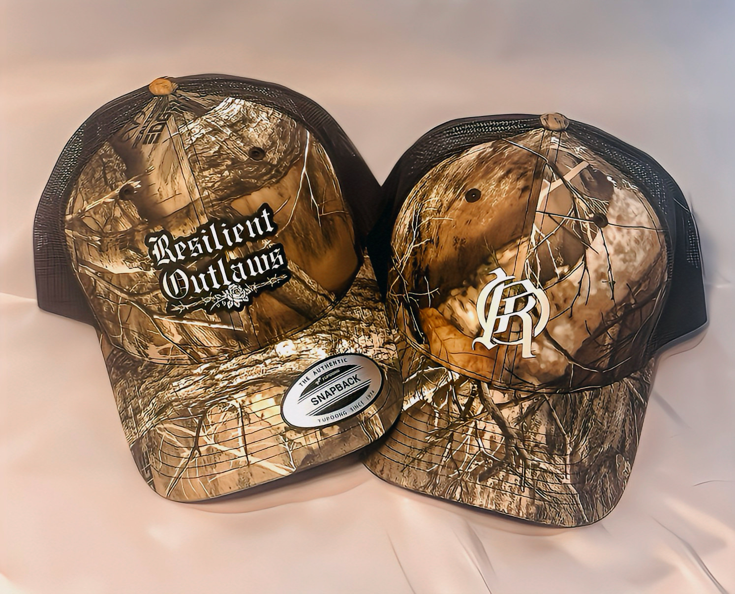 Resilient Outlaws Camo Trucker Snapback